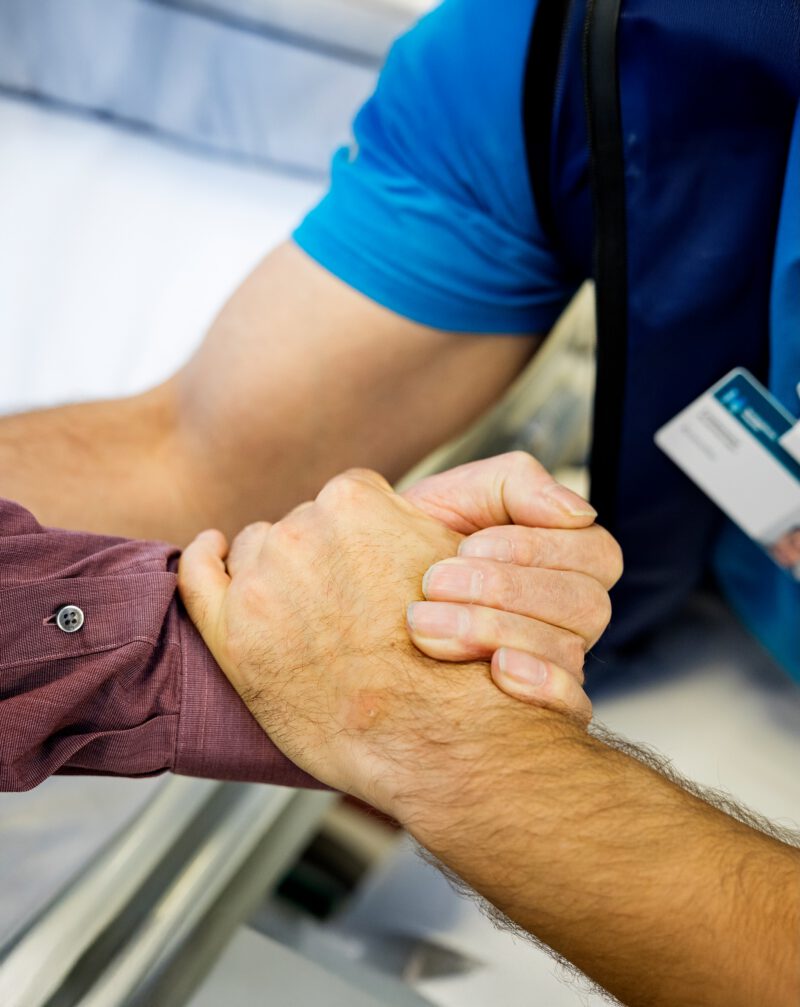 Nurse assisting a patient.