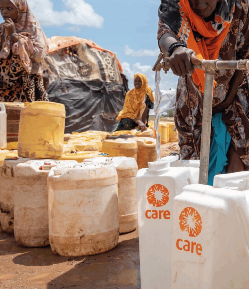 CARE Denmark - water in refugee camp.